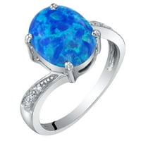 Oravo 1. CT ovalni oblik stvorio plavi opal i dijamant pasijans prsten od 14k bijelog zlata
